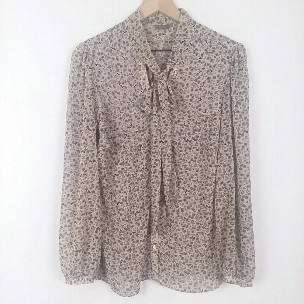 South floral semi sheer v neck with tie blouse